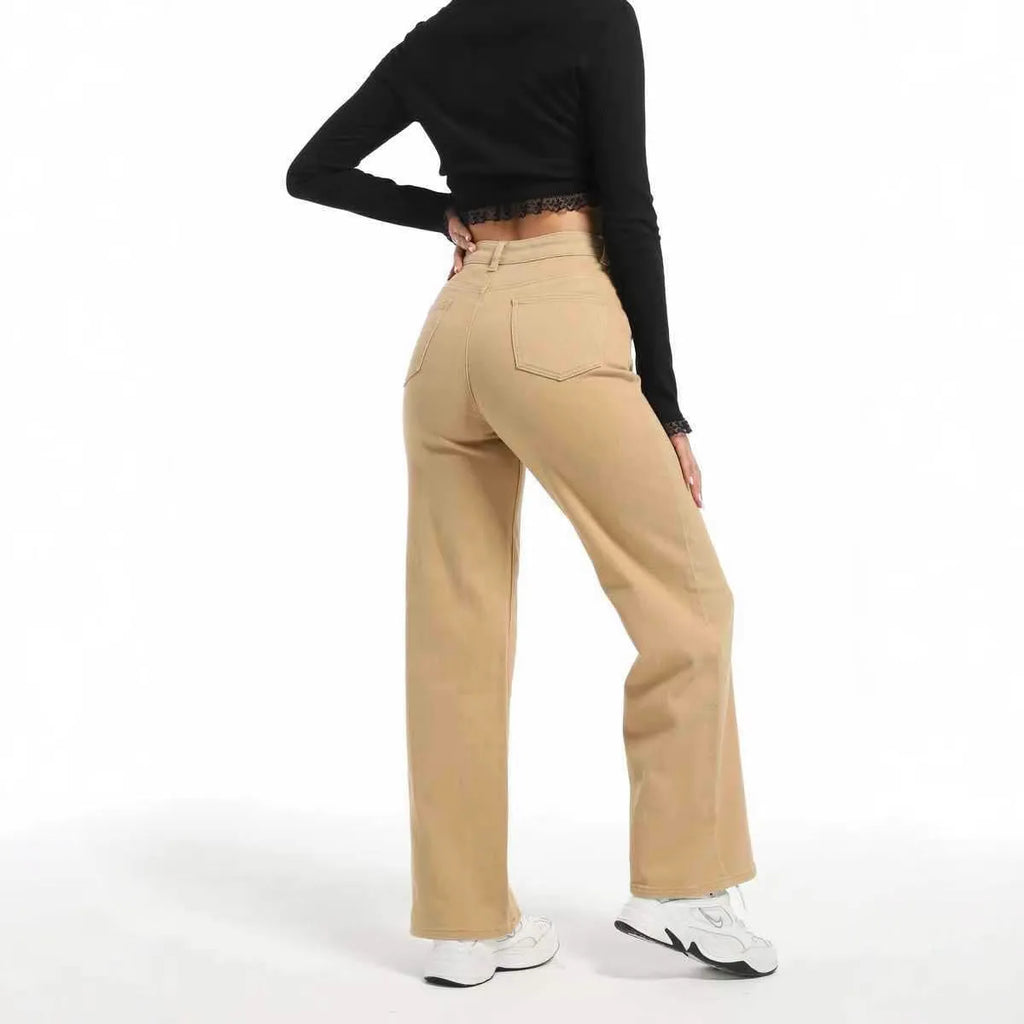 Women's apricot high-waist wide-leg cotton jeans laid flat showing straight leg cut.