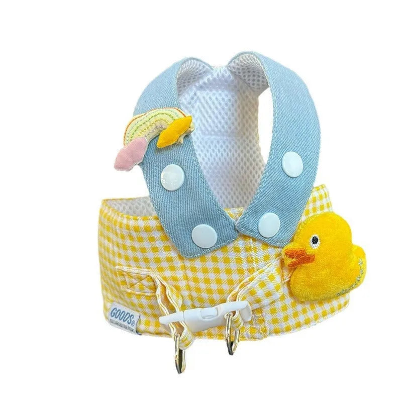 Three-piece pet set showing a dog harness, leash, wire rope pull, and a cute cotton hat on a small dog.