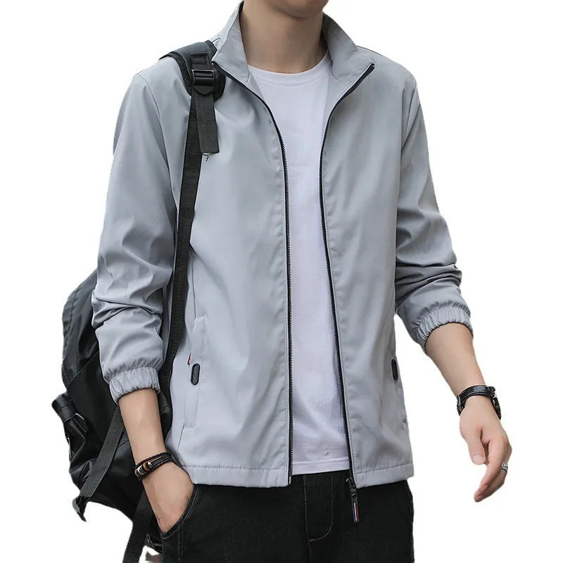 Men's loose fit Korean style lapel jacket in black casual autumn outerwear with zipper pocket