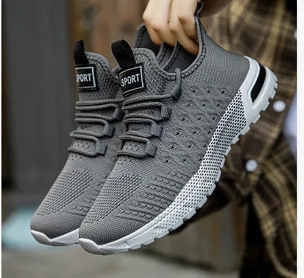 Men's mesh casual shoes in army green colour showing solid colour design and casual styling