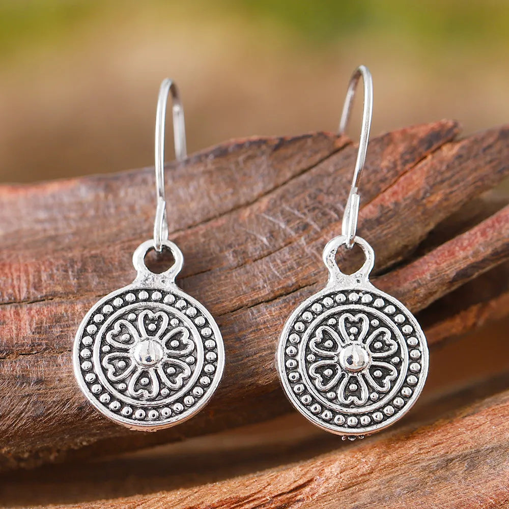 Bohemian retro geometric round earrings with distressed ethnic design in zinc alloy with electroplated finish