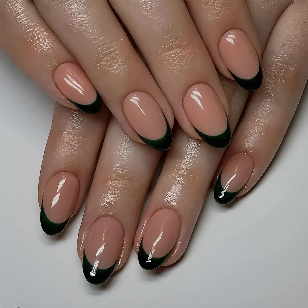 Set of 24 simple black French style false nails with a short almond shape on a clean background.
