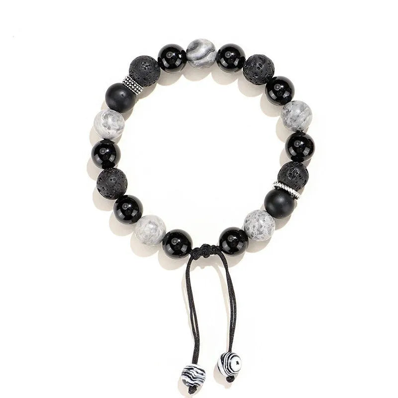 Black agate map stone bracelet with diamond shape design in New Chinese style.