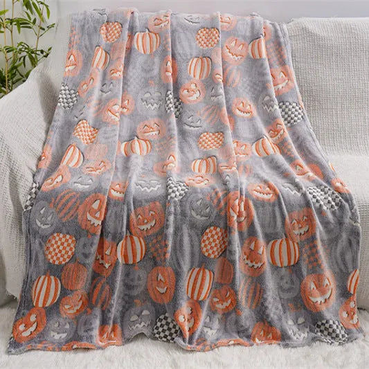 Colourful cartoon-pattern flannel blanket for children, shown in two size options.