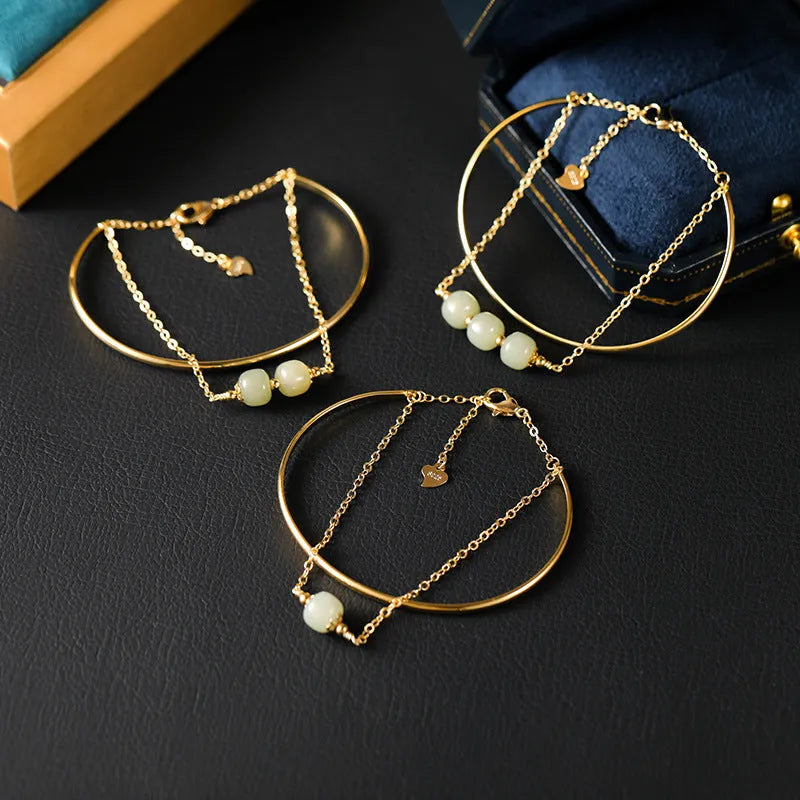 Women's Hetian jade lucky beads bracelet with gold inlay, showing single, double, and three bead style options.