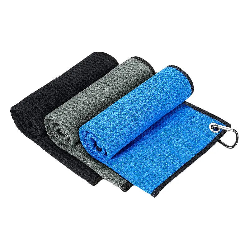 Waffle weave golf ball and club cleaning towel in blue colour showing textured surface