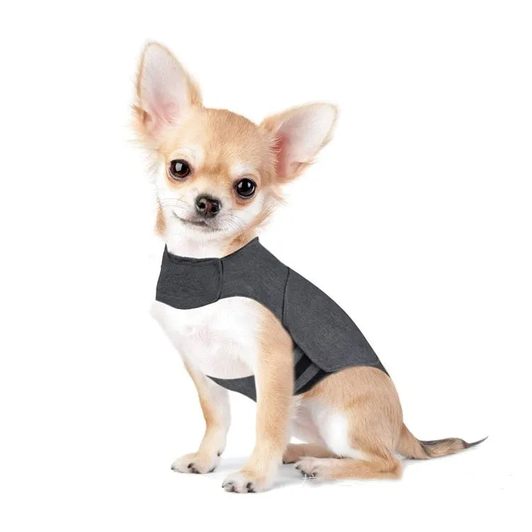 Heather grey dog anxiety vest or warm jacket on a size chart showing weights from under 4kg to over 50kg.