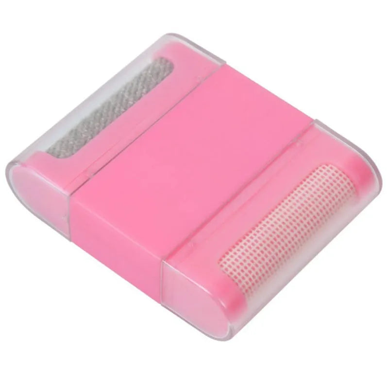 Manual fuzz remover brush with removable catching net for clothes and sofas, compact plastic design