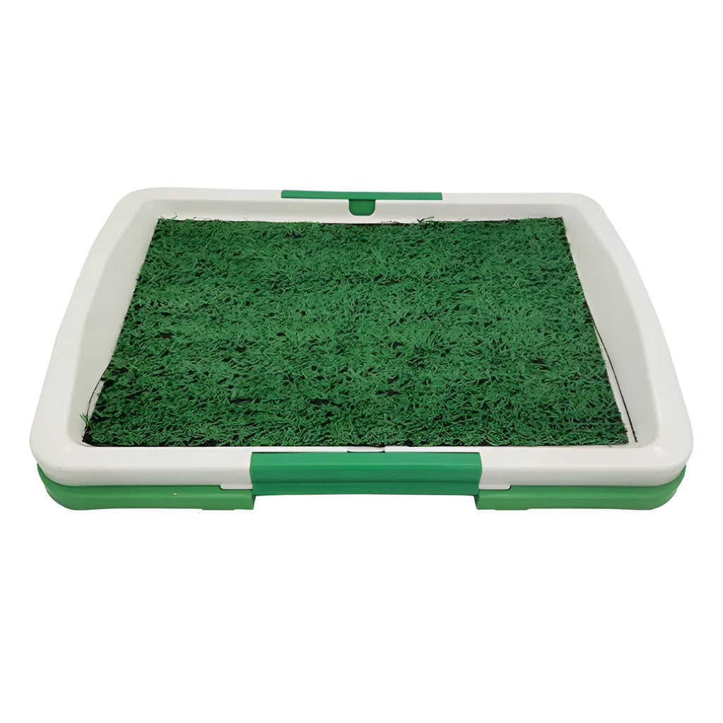 Green synthetic turf dog toilet tray with a plastic base for indoor puppy potty training.
