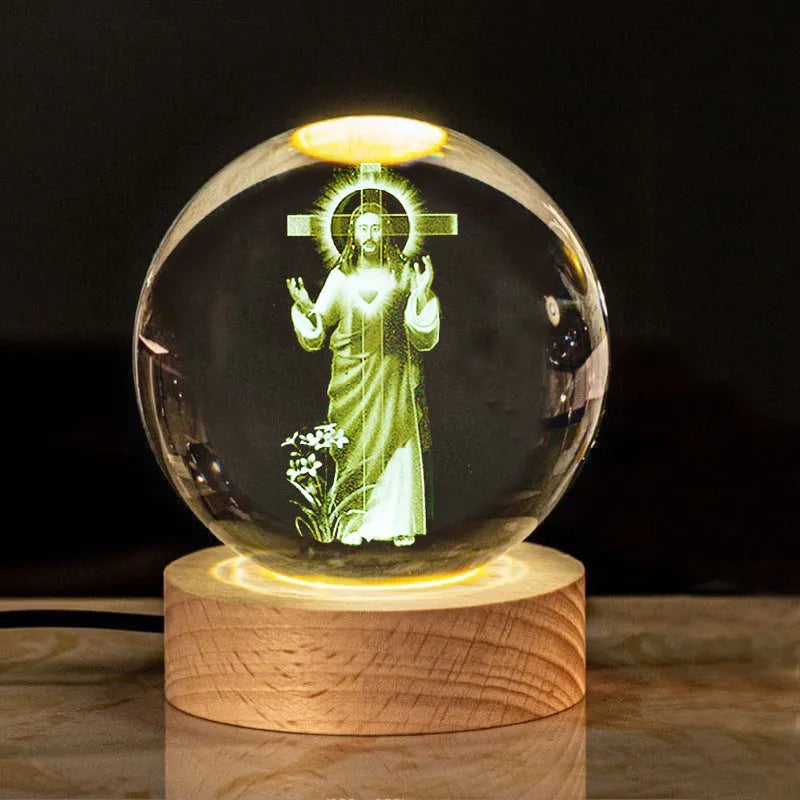 White crystal cross ornament with 6cm ball on wooden warm light base