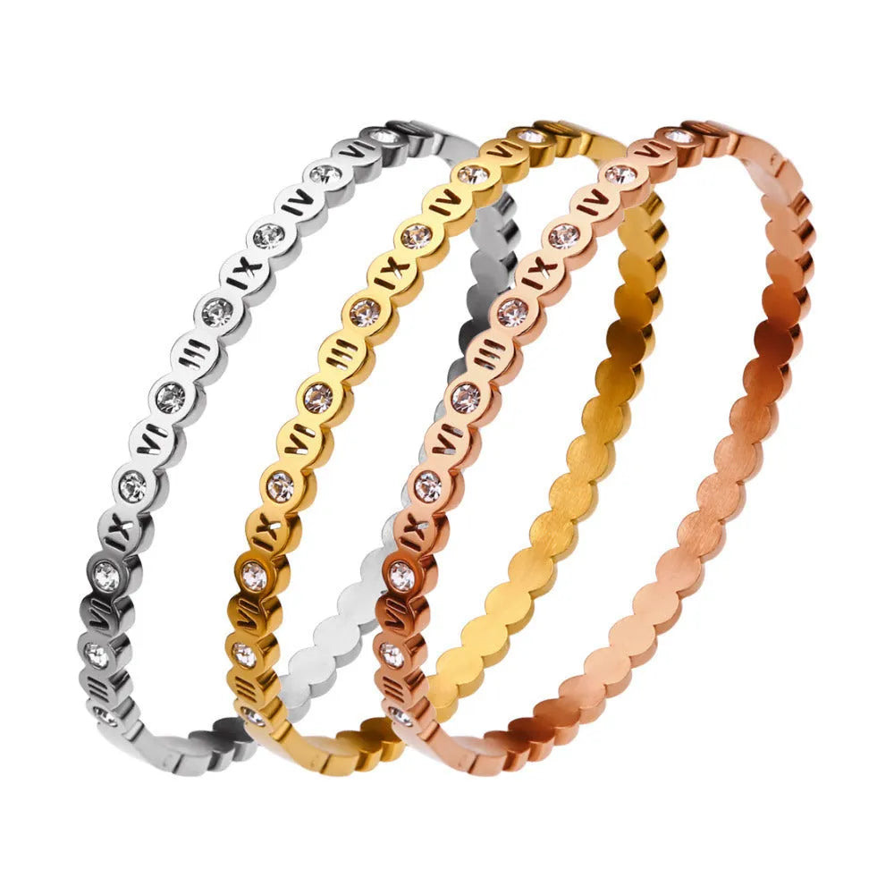 Korean style titanium steel bracelet with number detail in a choice of gold, rose gold, or steel colour.