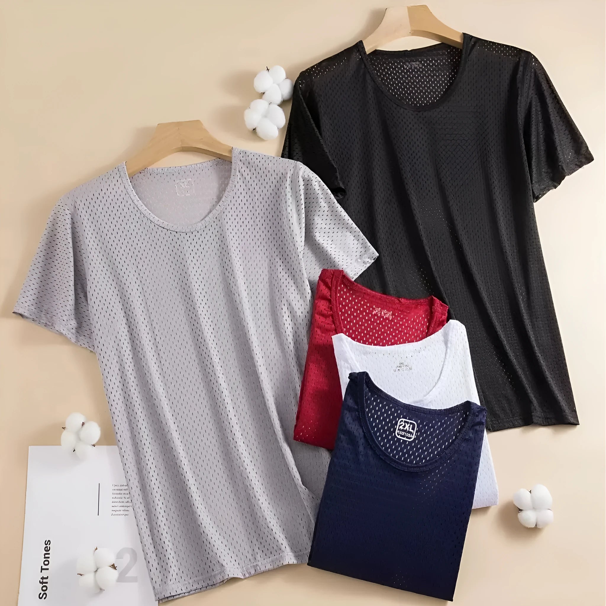 Men's solid colour ice silk short sleeve t-shirt on a hanger, showing loose crew neck and thin mesh fabric.