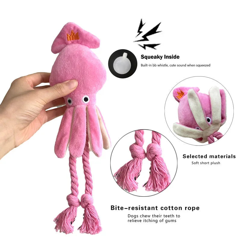 Pink squid-shaped dog chew toy with corduropy fabric, 32cm length with squeaker