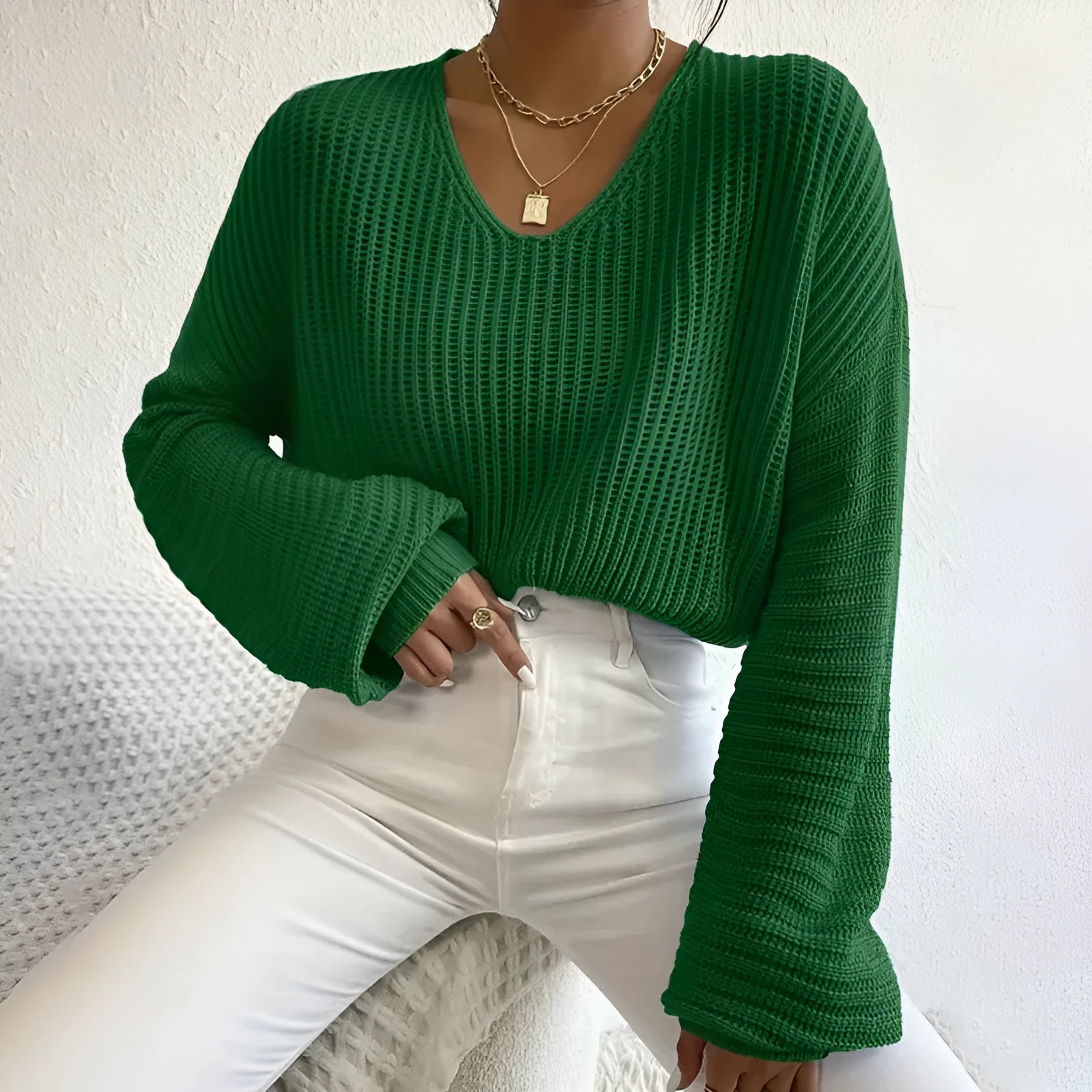 Women's solid colour polyester long sleeve pullover in five colour options with loose fit