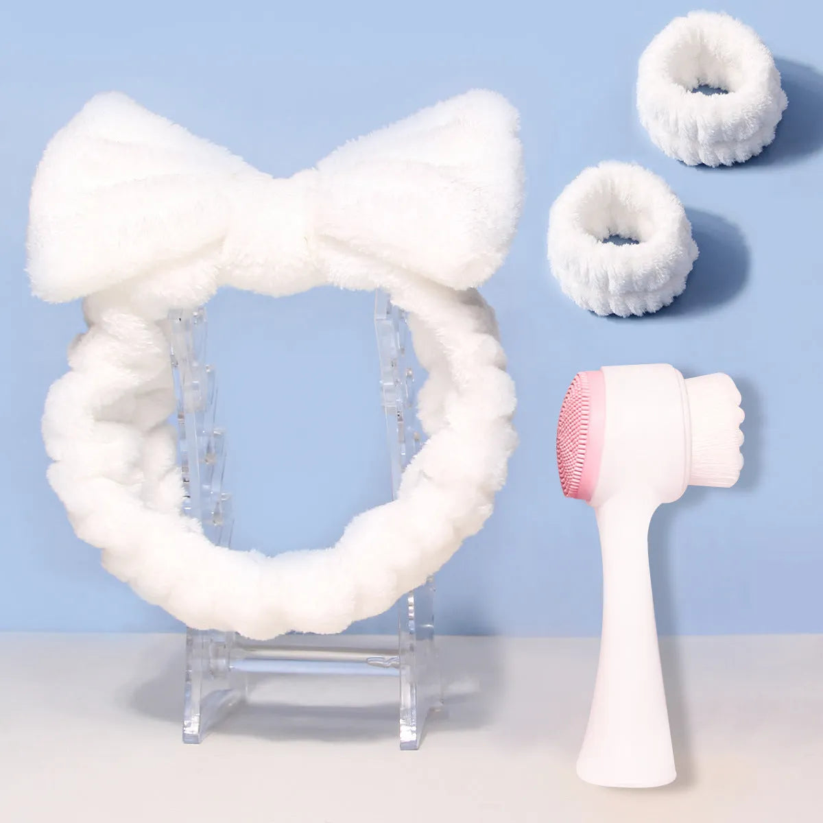 Facial brush set with coral fleece hairband in multiple colour options including purple, grey, white, and pink