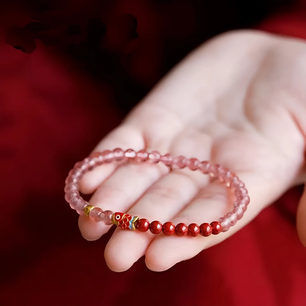 Purple cinnabar and pink strawberry quartz bracelet with koi and peach blossom design