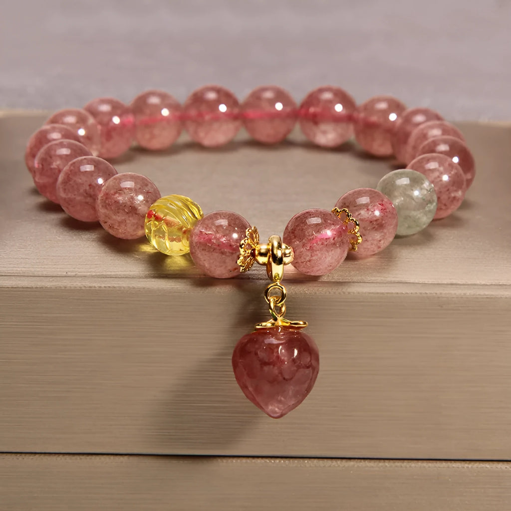 Natural garnet multi-layer crystal bracelet with strawberry quartz, moonstone, and pendant details in Korean light luxury style