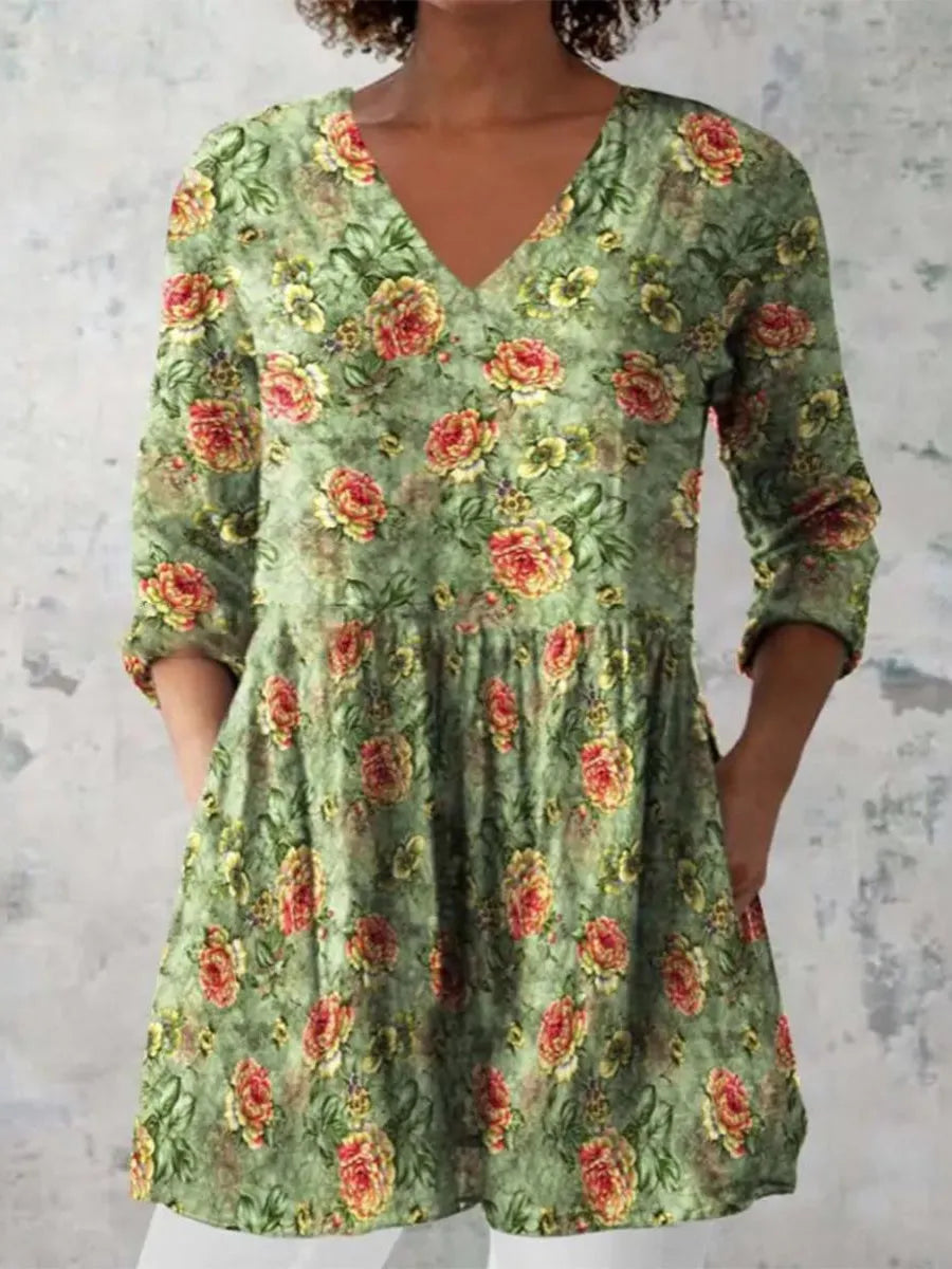 Women's printed wave pattern loose dress with wide waist and 3/4 length sleeves.