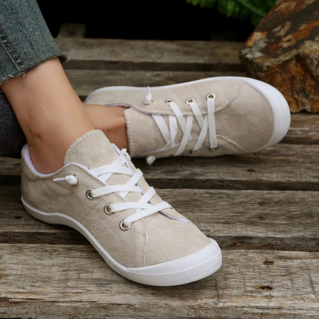 Women's creamy white fabric low-top casual sneakers with rubber sole