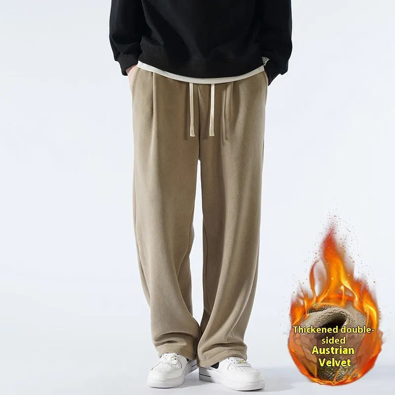 Men's apricot double-sided polar fleece trousers with a wool lining, shown with a drawstring waist.