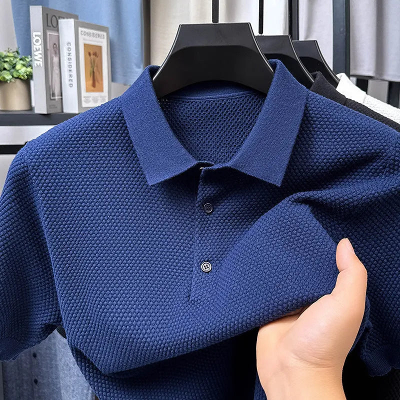 Loose fit pure cotton short sleeve pullover sweater shown in various colours including grey and navy.
