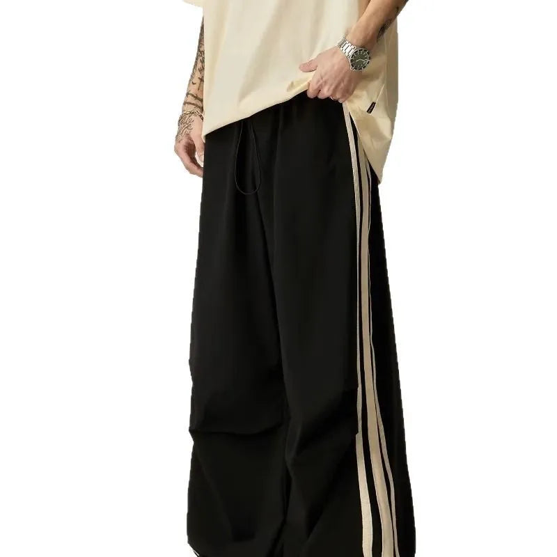 Black wide leg climbing trousers with high waist and straight-leg design