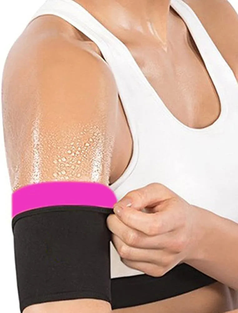 Blue compression arm band with a separate black wrist support strap laid flat.