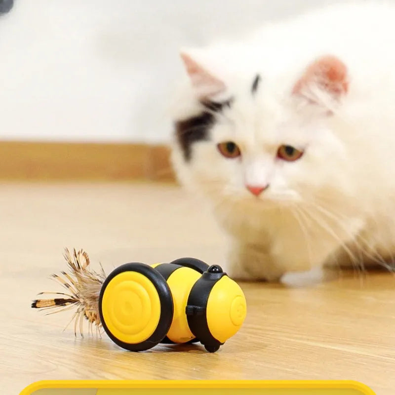 Electric bee-themed cat toy with feather attachments in pink or yellow colour options