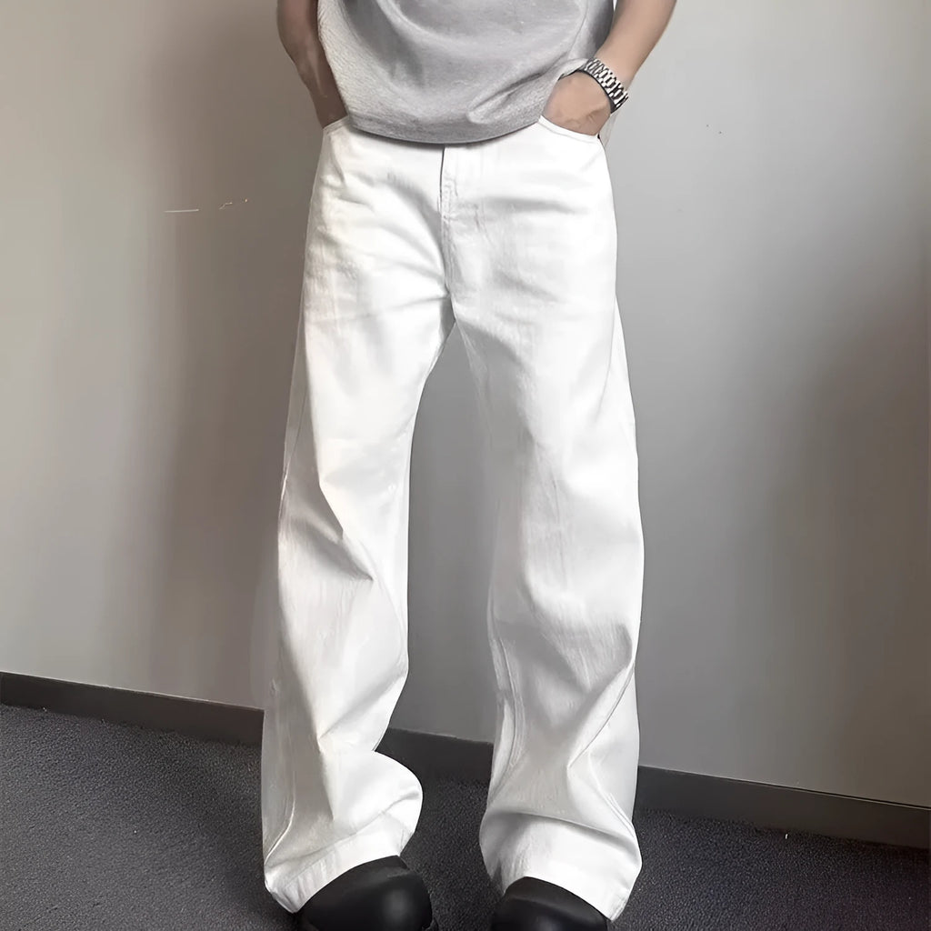 Men's white loose straight-leg jeans with wide leg openings and mid-waist design