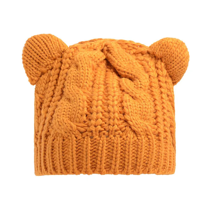 Hand made knitted cat ear beanie in winter colours with 3D design