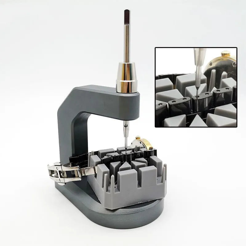 Silver professional press strap removal tool made of tool steel for watch and electronics repair.