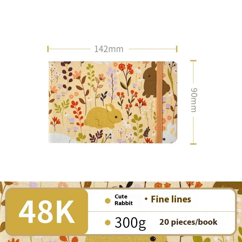 Feiluniao handmade fabric watercolour notebook in 185mm portable size, showing artistic cover design.