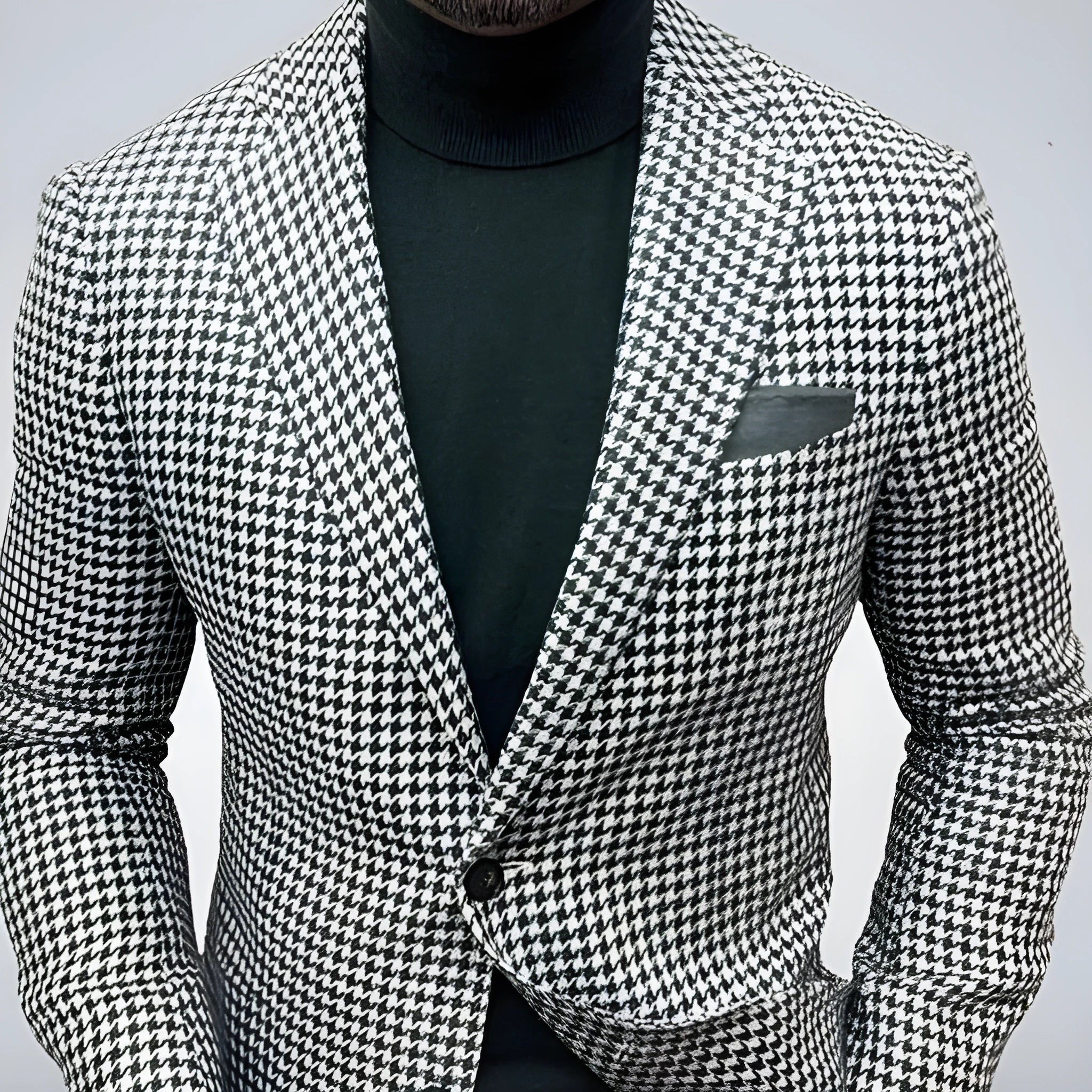 Men's slim fit two-button suit jacket with top-stitched pockets in a black colour option.