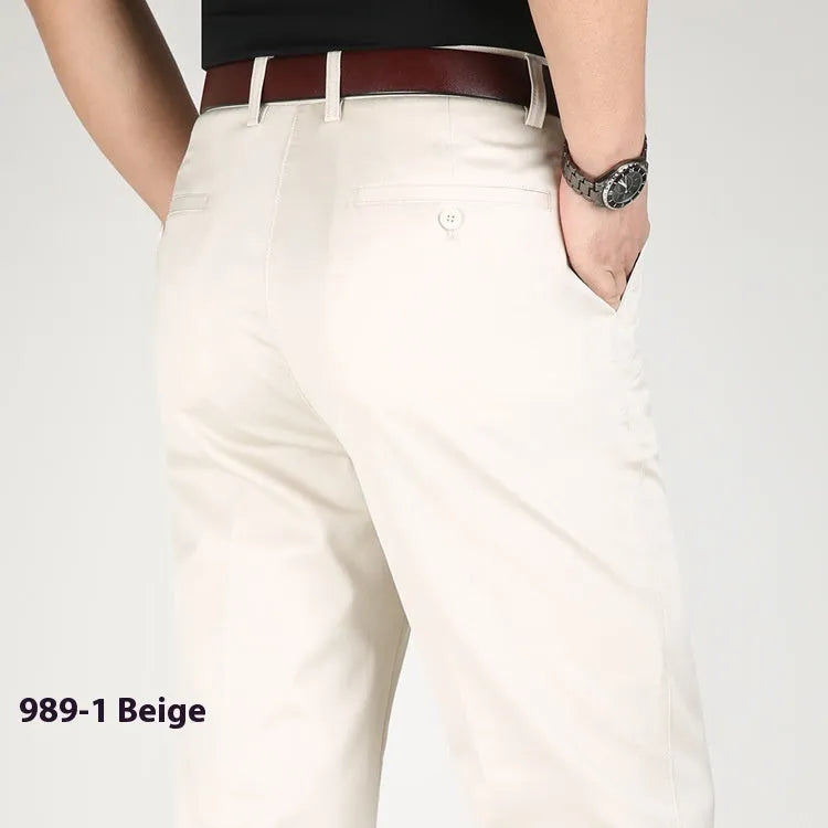 Men's elastic cotton high waisted loose trousers in khaki yellow, front view