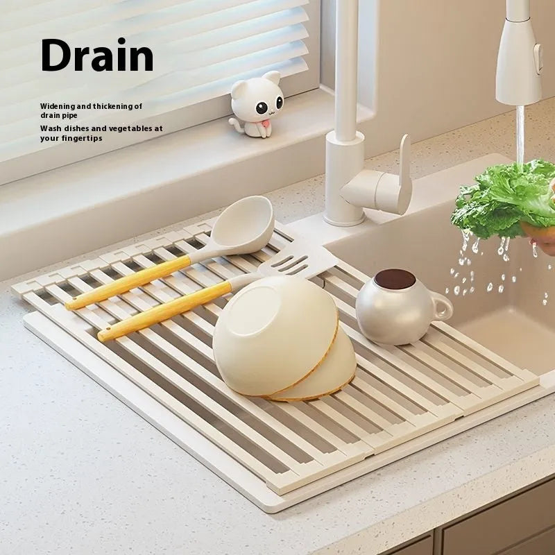 Foldable milky white stainless steel kitchen draining rack showing tri-fold design