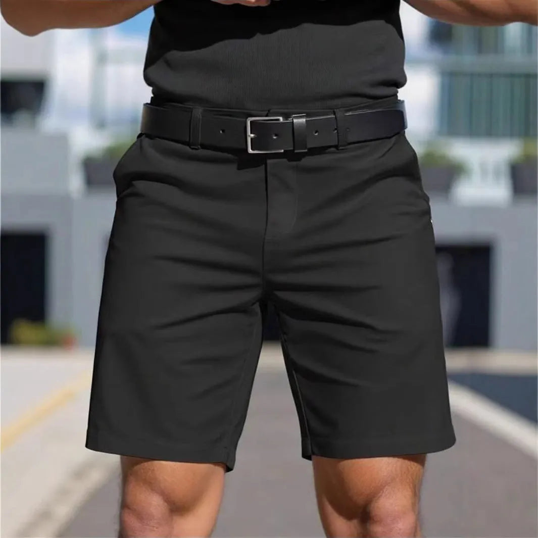 Men's straight cut solid colour shorts in light blue, showing fifth pants length and micro elastic polyester fabric.