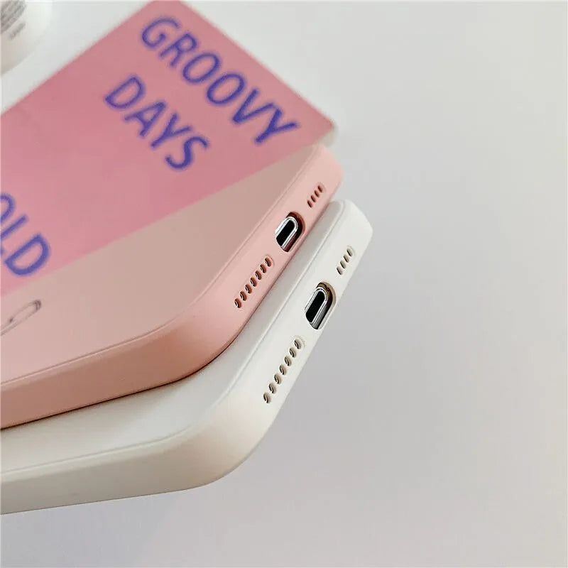 A solid-colour TPU silicone back cover case for Apple iPhone models, shown in multiple colour options.