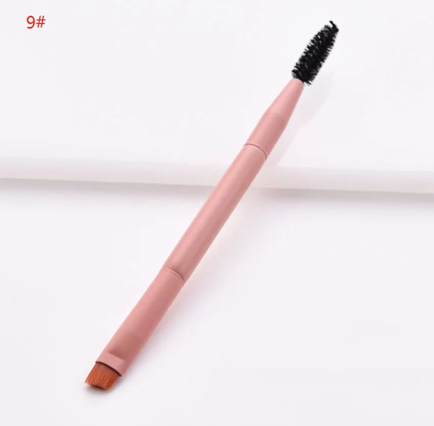 Ten professional makeup brushes with wooden handles arranged by size for different cosmetic applications