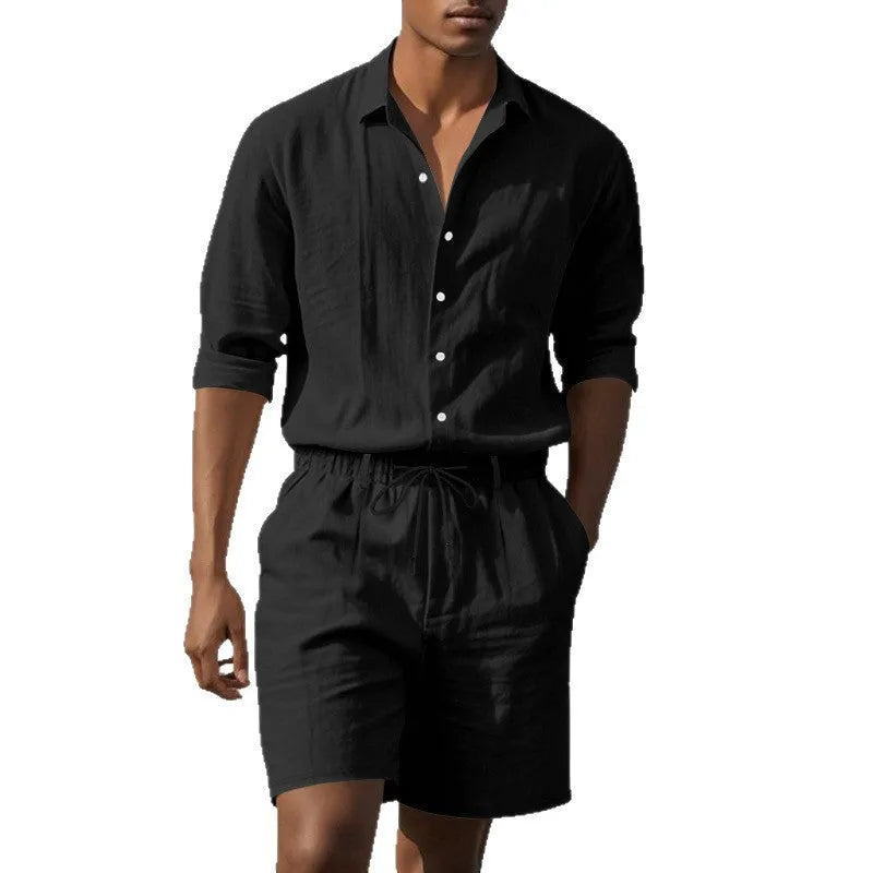Linen long sleeve shirt and matching shorts beach set in light blue, laid flat.