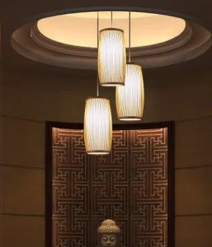 Bamboo wall light with woven plait design measuring 15cm diameter