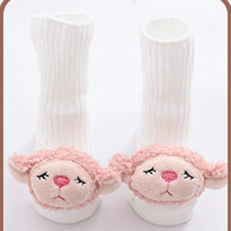 Cotton baby socks in multiple colours and prints including panda, lion, bows, and stars on a white background.