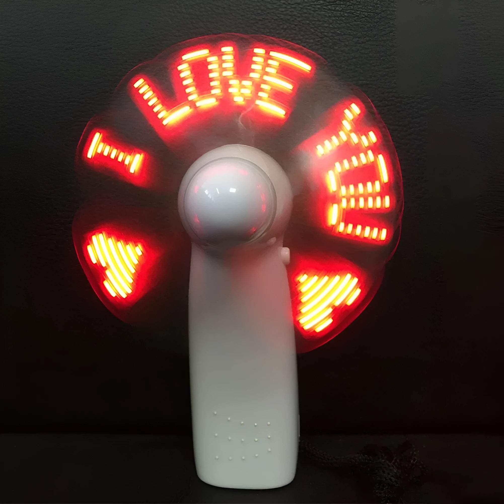 White handheld mini fan with flashing blue and red LED love pattern lights