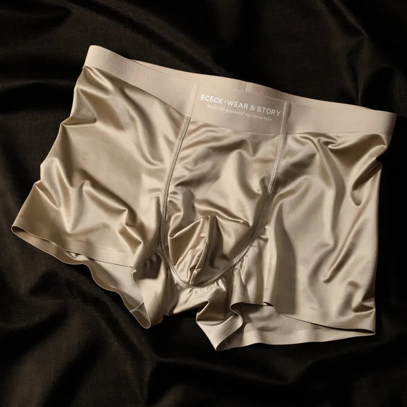 Men's colourblock Ice Silk seamless underwear in blue, brown, gray, and white colours.
