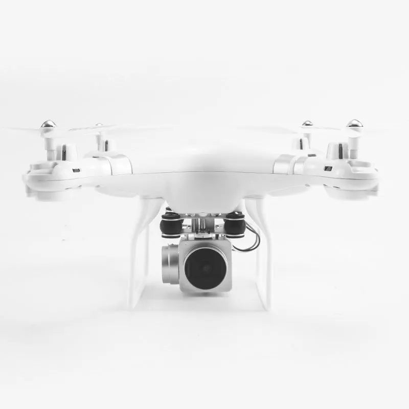 Black alloy HD aerial photography drone with remote control handle, flying outdoors.