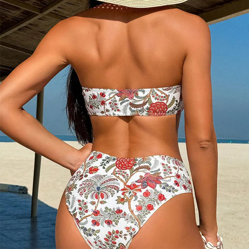 Women's printed bandeau swimsuit with triangle design and matching shorts for swimming