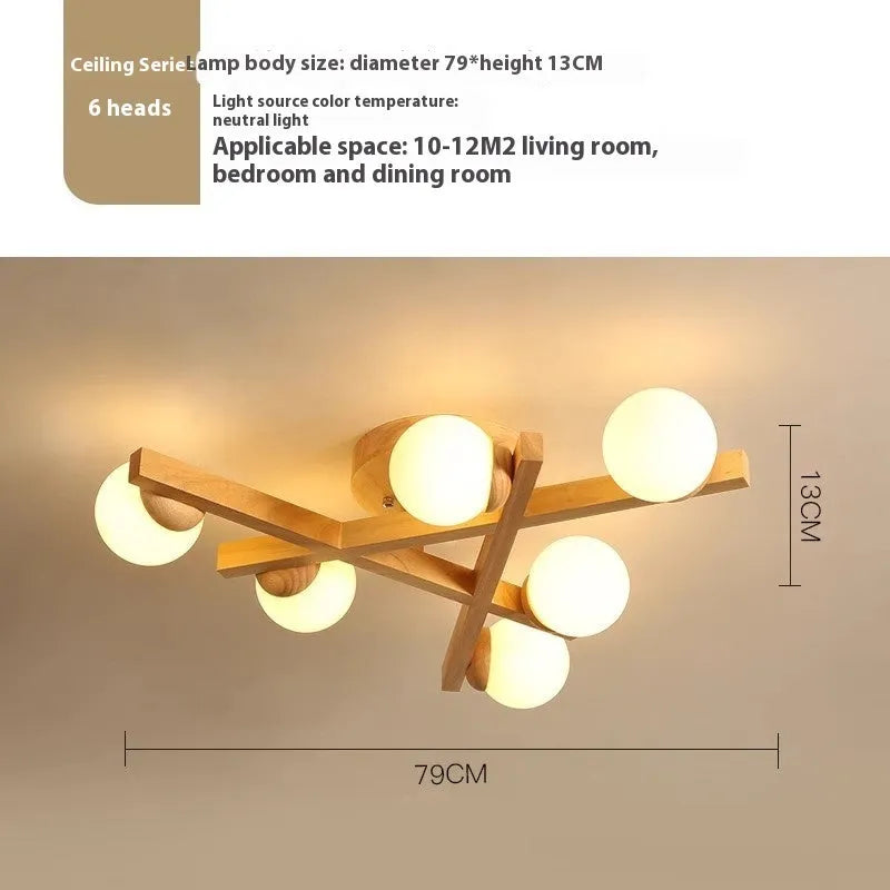 Modern wooden finish ceiling light with three adjustable lamp heads in a neutral white colour.
