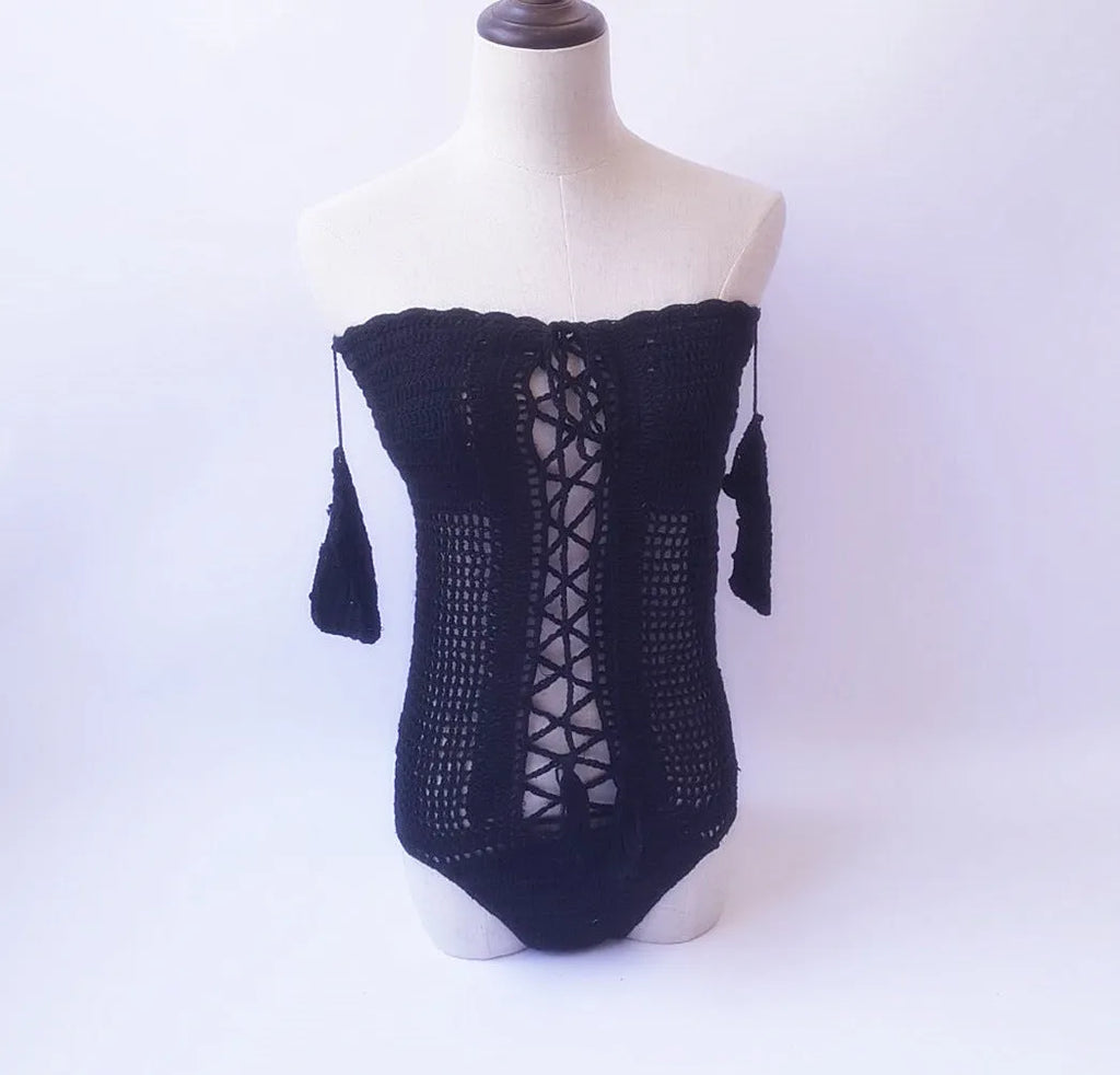 Off-shoulder one-piece swimsuit in polyester fabric on mannequin