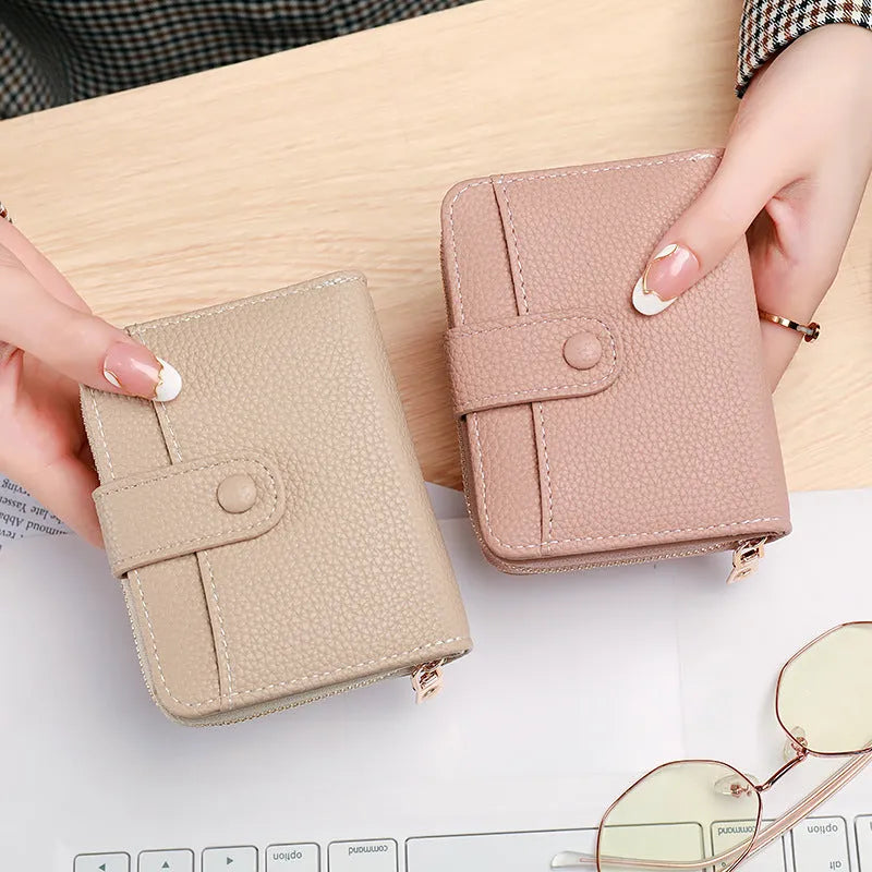 Ladies short wallet with lychee pattern texture in PU leather showing 2-fold design