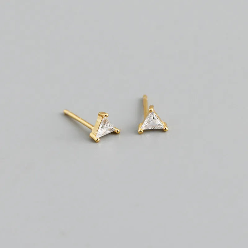 Pair of triangle colour zircon stud earrings in S925 silver on a white background