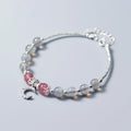 Natural moonstone bracelet with extension chain showing crescent moon and crystal accents